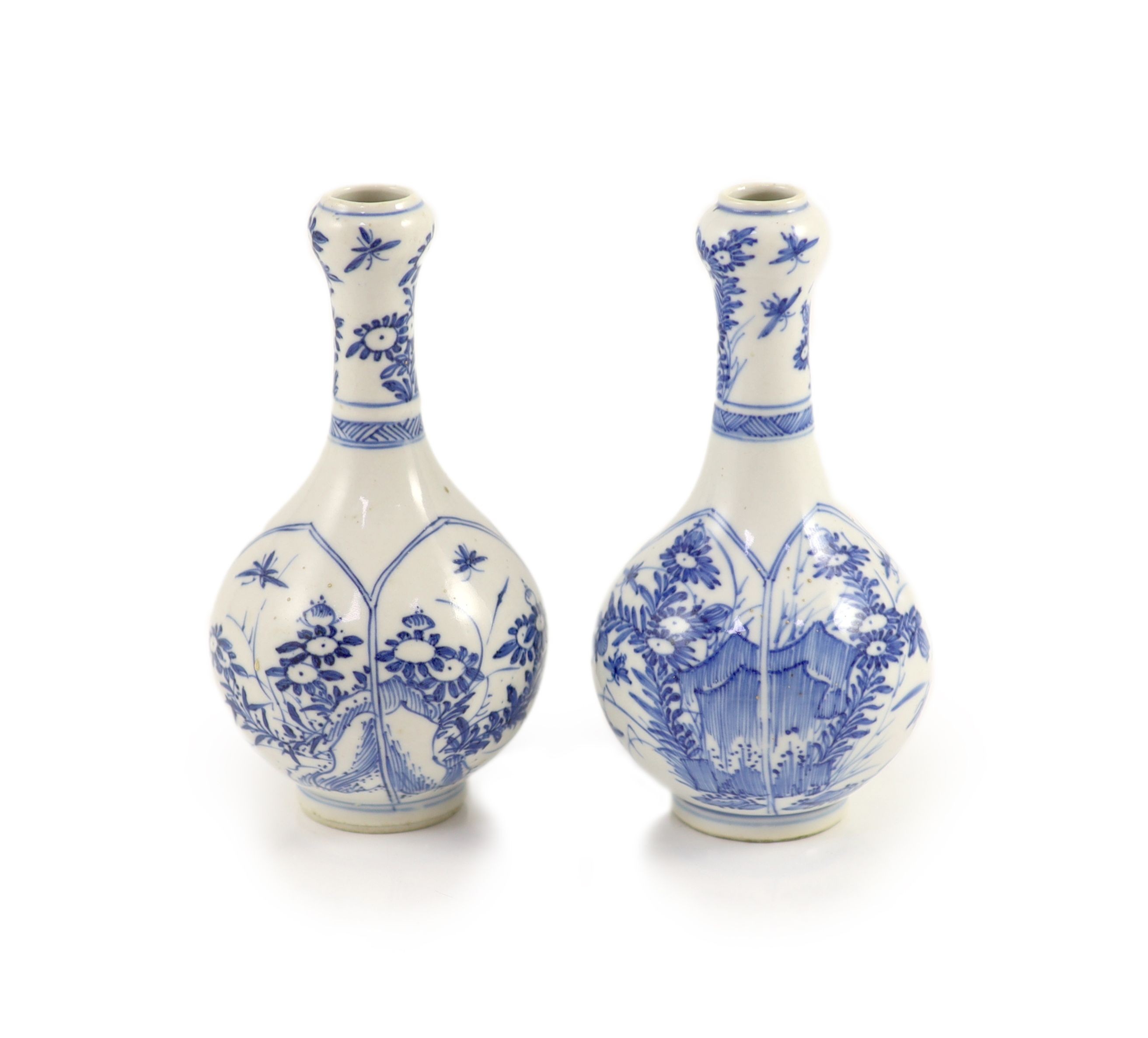 A pair of small Chinese blue and white garlic-neck vases, Kangxi period 13.5 cm high